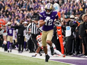 Denzel Boston, Washington football player, in action.