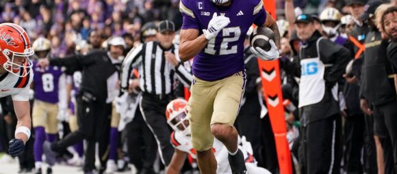 Denzel Boston, Washington football player, in action.