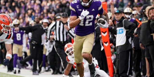 Denzel Boston, Washington football player, in action.