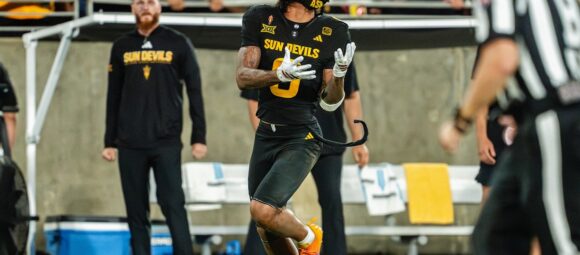 Jordyn Tyson, Arizona State football player, in action.