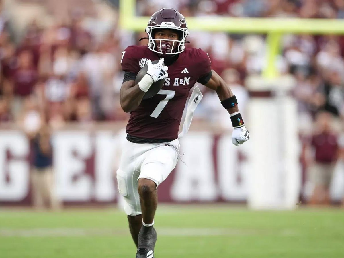 KC Concepcion, Texas A&M football player, in action.
