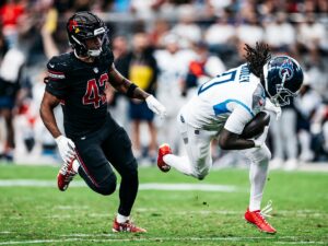 Calvin Ridley breaks free against a Cardinals defender on October 5 2025