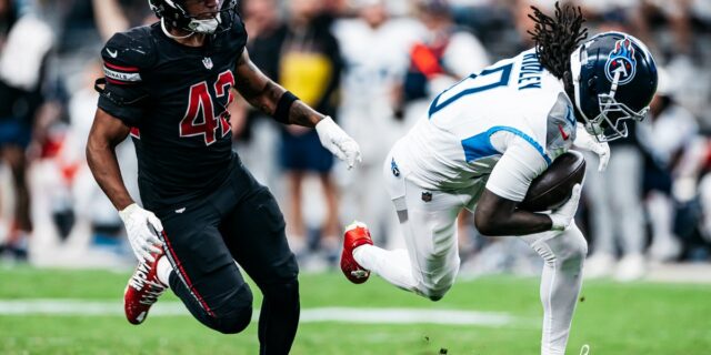 Calvin Ridley breaks free against a Cardinals defender on October 5 2025