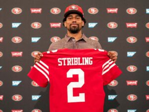 De'Zhaun Stribling holds his San Francisco 49ers No. 2 jersey at his post-draft introduction press conference