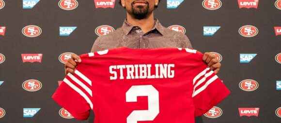 De'Zhaun Stribling holds his San Francisco 49ers No. 2 jersey at his post-draft introduction press conference