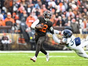 Shedeur Sanders scrambles for the Cleveland Browns against the Titans