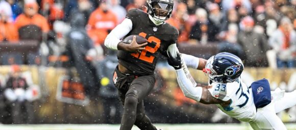 Shedeur Sanders scrambles for the Cleveland Browns against the Titans