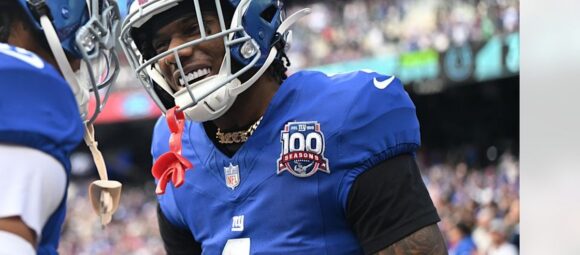 Malik Nabers celebrates in his New York Giants uniform during a game at MetLife Stadium