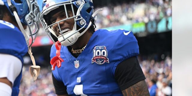 Malik Nabers celebrates in his New York Giants uniform during a game at MetLife Stadium